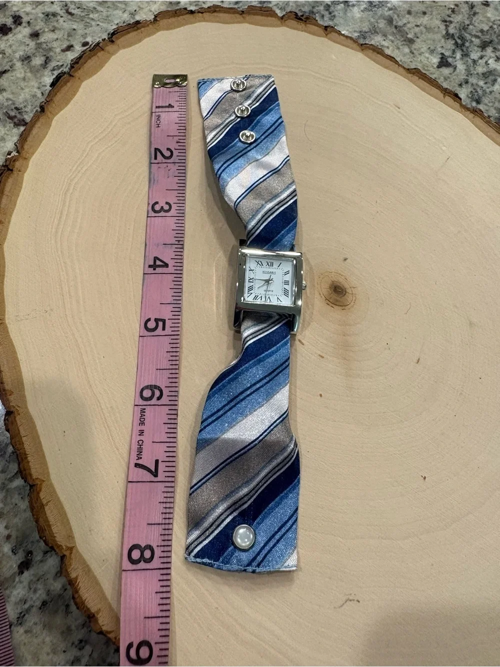 Kessaris silver square face with 6 cloth bands watch in GUC needs new battery